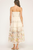 Vestido strapless beige con flores