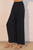 Pantalón negro pierna amplia
