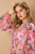 Blusa rosa floral de manga larga