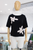 T-shirt negra flores