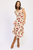 Vestido beige con rosas