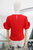 Blusa roja flor