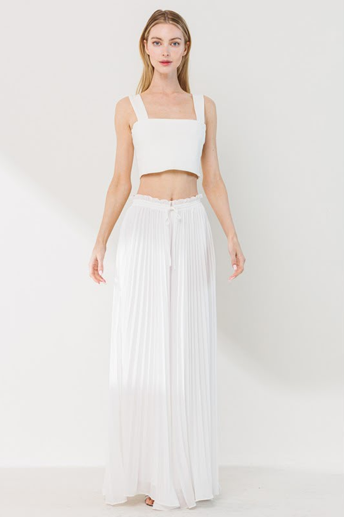 Pantalón blanco plisado