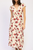Vestido beige con rosas
