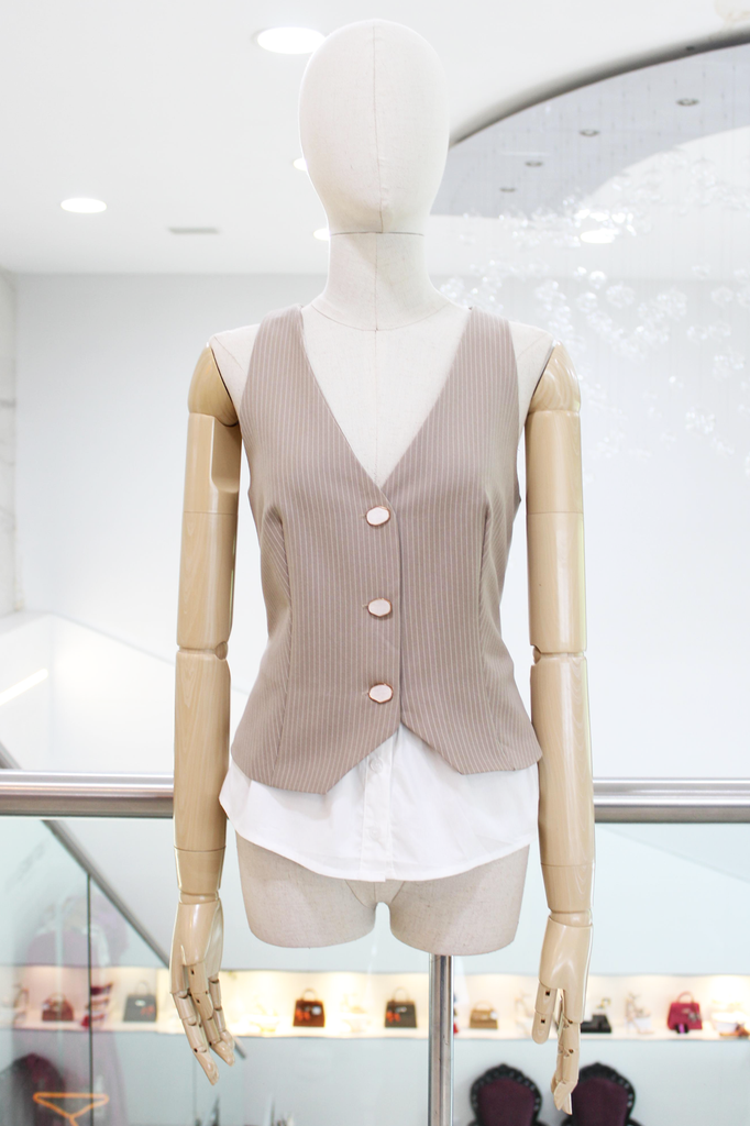 Chaleco beige con rayas