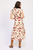 Vestido beige con rosas