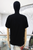 T-shirt negra gatito