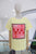 T-shirt amarilla con langosta