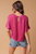Blusa fucsia nudo