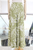 Pantalón verde con palmeras