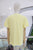 T-shirt amarilla con langosta