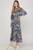 Vestido azul con flores beige