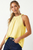 Blusa trenzada amarilla