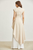 Conjunto beige y blanco