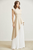 Conjunto beige y blanco