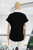 T-shirt negra flores estoperoles
