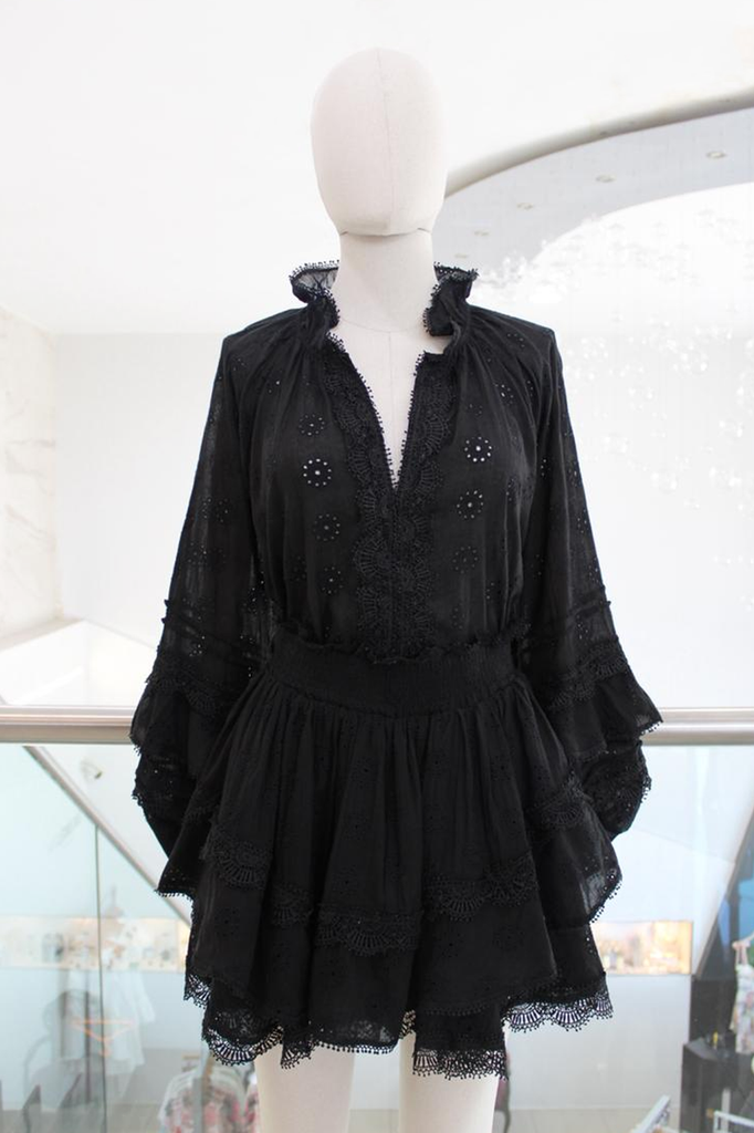 Conjunto negro blusa y falda