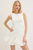 Vestido corto blanco volantes