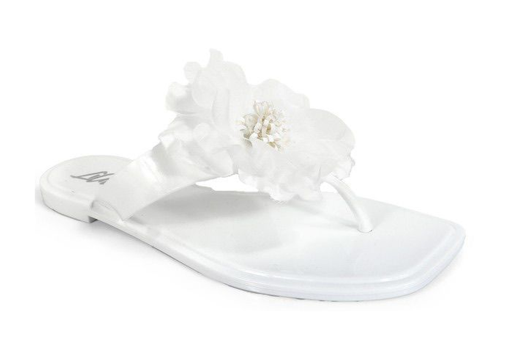 Sandalias blancas con flor
