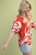 Blusa naranja estampada