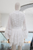 Conjunto blanco blusa y falda