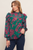 Blusa verde con flores magenta