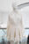 Conjunto beige blusa y falda
