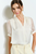 Blusa satin perla