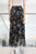 Falda café print floral