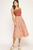 Vestido midi estampado rojo quemado