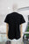 T-shirt negra con langosta