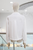 Blusa blanca con encaje floral