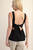 Blusa negra peplum
