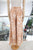 Pantalón beige con palmeras