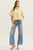 Blusa camisera amarilla