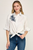 Camisa blanca flor
