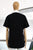 T-shirt negra conchitas