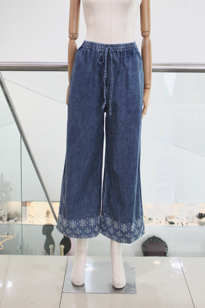 Pantalón denim flores