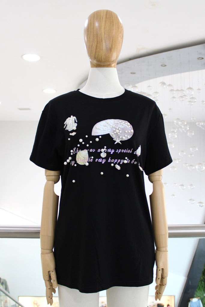 T-shirt negra conchitas