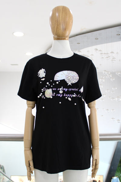 T-shirt negra conchitas