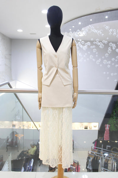 Conjunto ivory chaleco y falda
