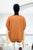 Blusa de seda terracota