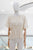 Blusa plisada beige perlas