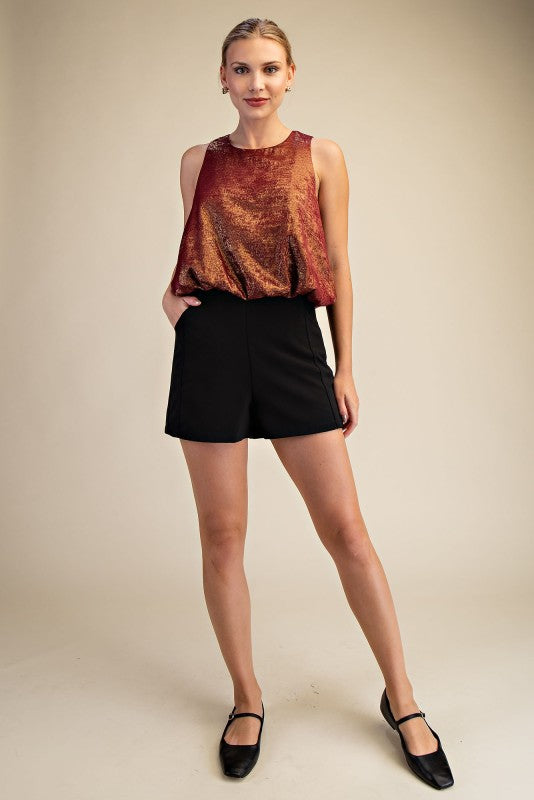 Blusa metálica vino 30/15%