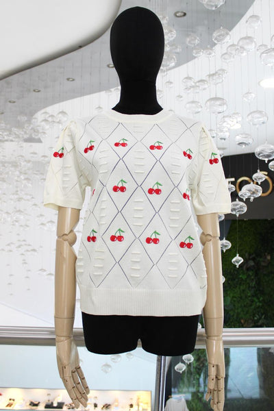 Blusa beige cerezas