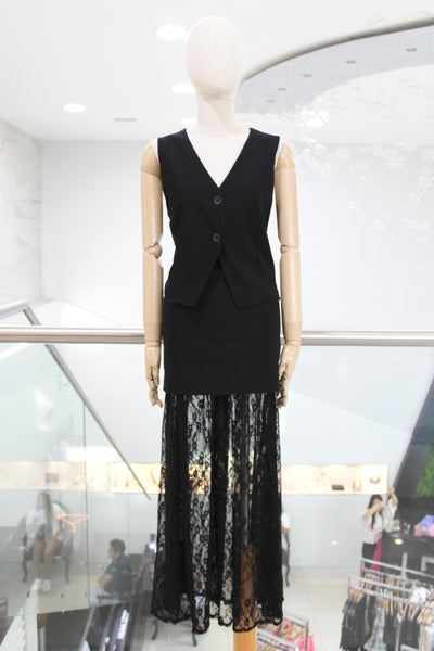Conjunto negro chaleco y falda