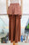 Falda plisada terracota