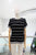Blusa negra con rayas
