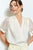 Blusa satinada perla