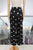 Pantalón negro con círculos
